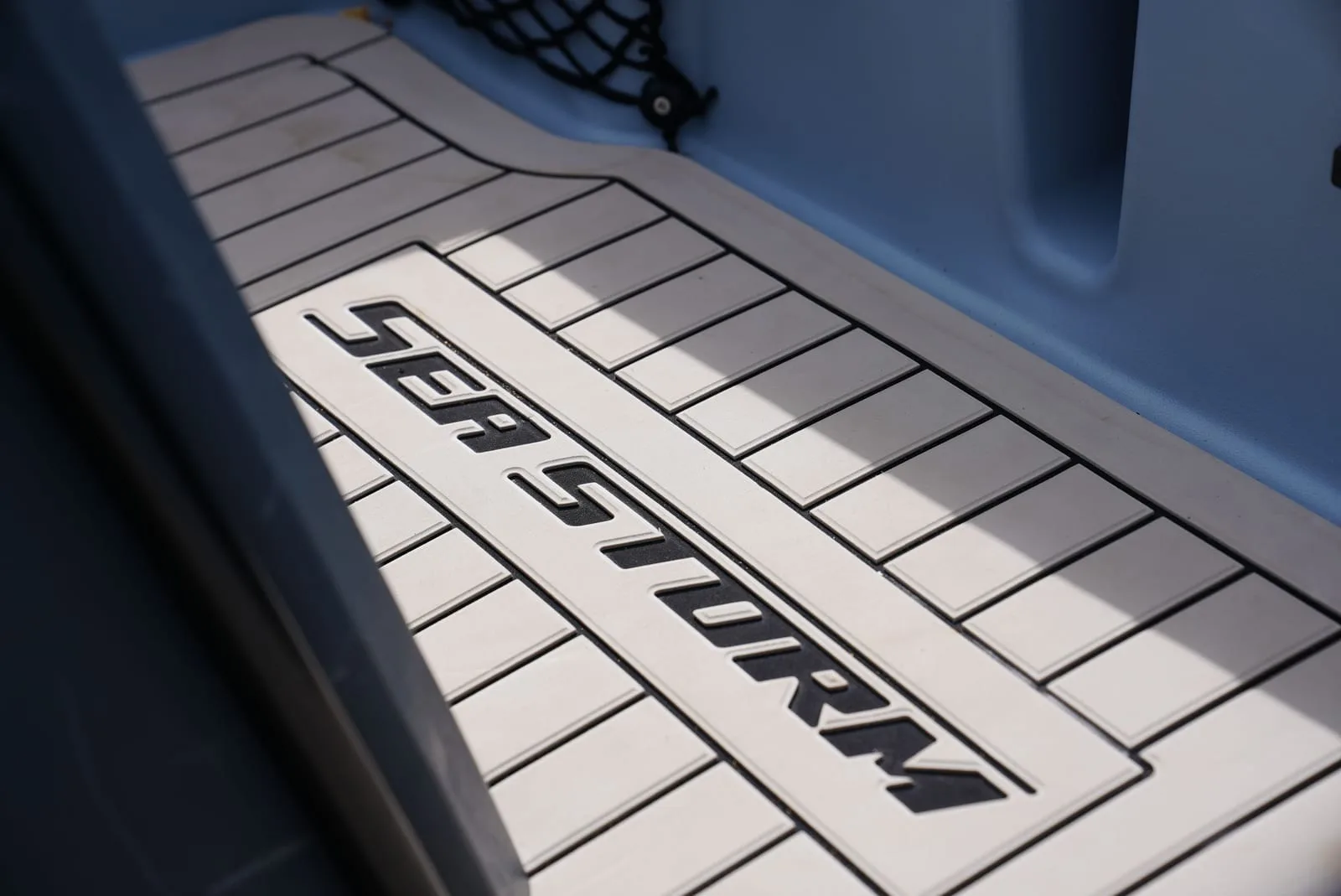 Deck covering of the SeaStorm 13s with embossed SeaStorm logo