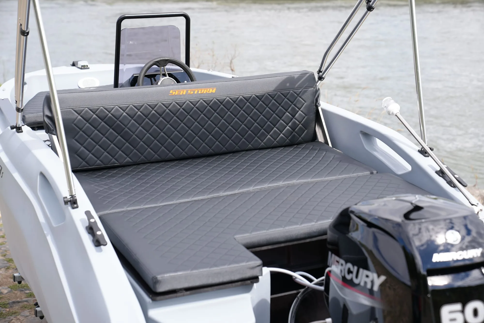 Sun lounger in the stern of the SeaStorm 13s
