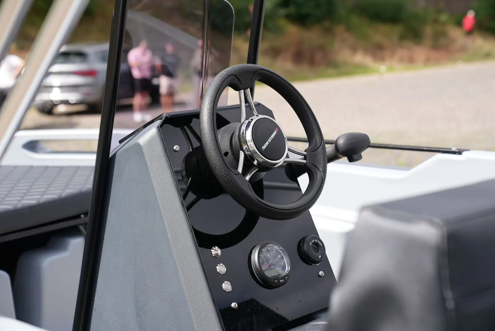 Helm station of the SeaStorm 13s with sports steering wheel
