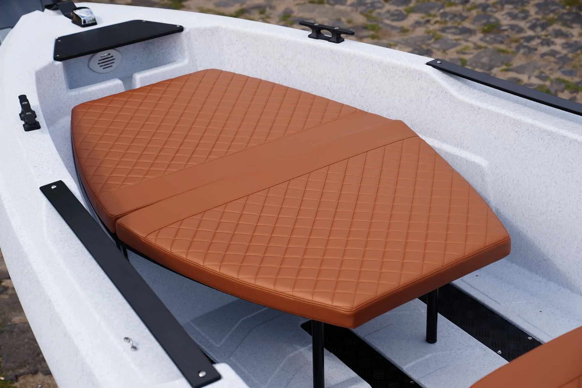 Sun lounger in the bow of the SeaStorm 17