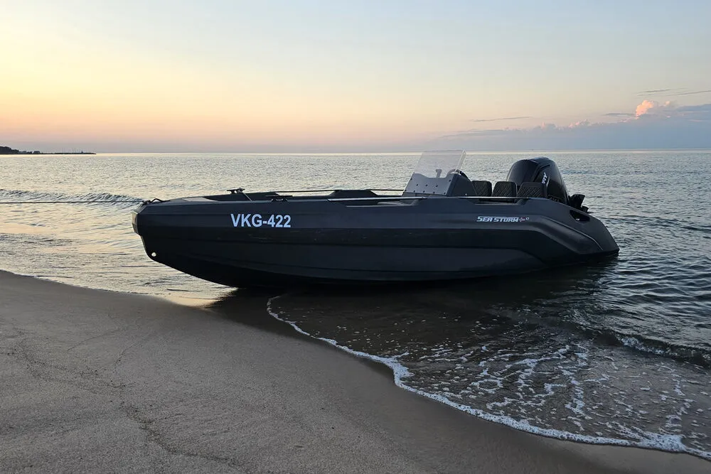SeaStorm 17 in evening light on the water, rental and charter boat